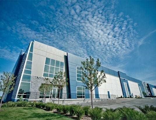 The new warehouse is located at 106-34 Highland Park Way NE, Airdrie, AB, T4A 0R1.