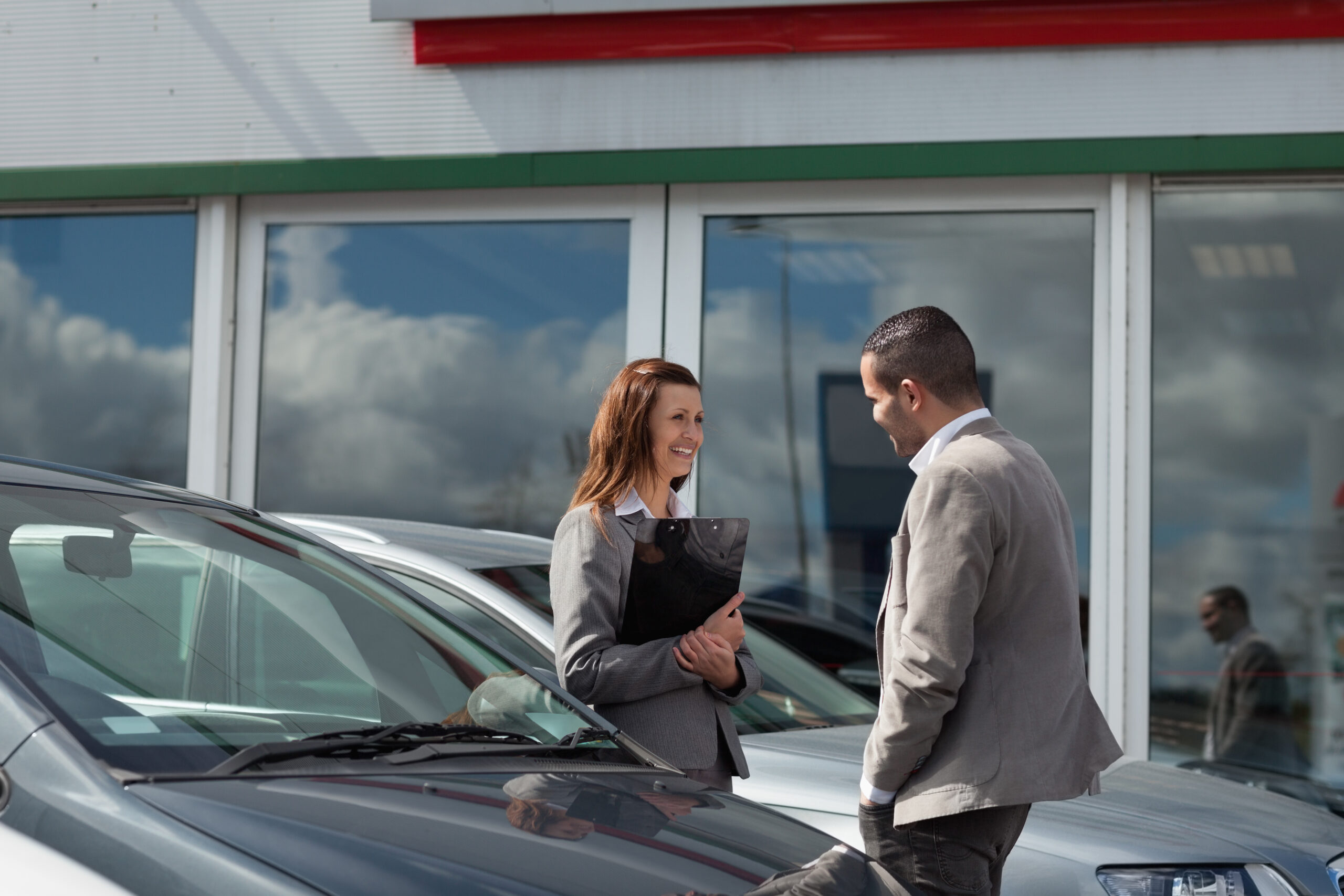 dealer salesperson with customer