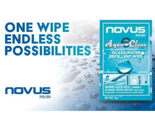Promotional graphic for NOVUS® Polish AquaClear Glass Water Repellent Wipe featuring a blue product sachet and the headline "ONE WIPE ENDLESS POSSIBILITIES" against a background of water droplets. Inset images show the product's use on car windshields and glass showers.