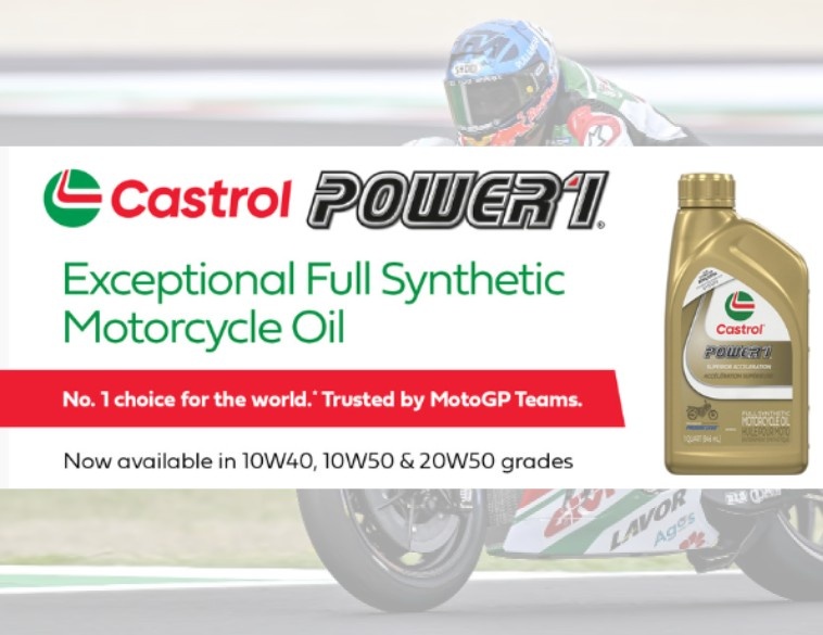 Promotional banner for Castrol Power1 full synthetic motorcycle oil featuring a 10W-50 bottle and a MotoGP racer. The text identifies it as a top choice for world teams and lists available grades: 10W40, 10W50, and 20W50.