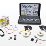 Edelmann EPS repair kits and components displayed on a white background, including a drive belt, torque sensors, motor couplings, gaskets, and a specialized tool set.